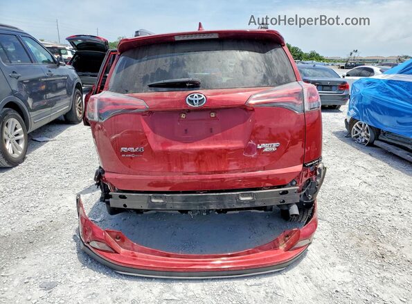 JTMDFREV0JD242094 2018 TOYOTA RAV4 Red Rear view