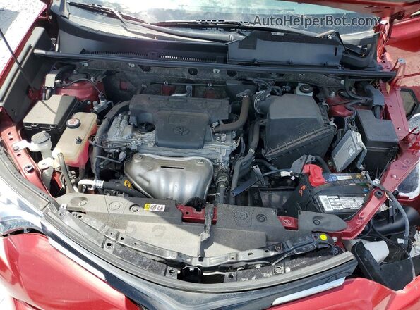 JTMDFREV0JD242094 2018 TOYOTA RAV4 Red Rear interior view