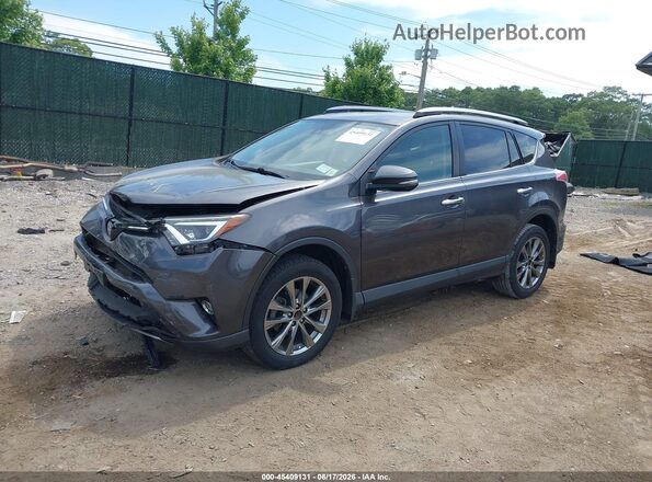 JTMDFREV0JJ190919 2018 TOYOTA RAV4 Gray Front left