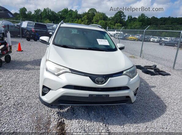 JTMDFREV1HD207719 2017 TOYOTA RAV4 White Սարքավորումների վահանակի տեսք