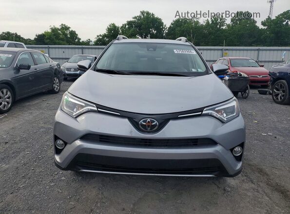 JTMDFREV1JD239463 2018 TOYOTA RAV4 Gray Front view