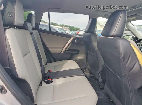 JTMDFREV1JD239463 2018 TOYOTA RAV4 Gray Rear interior view