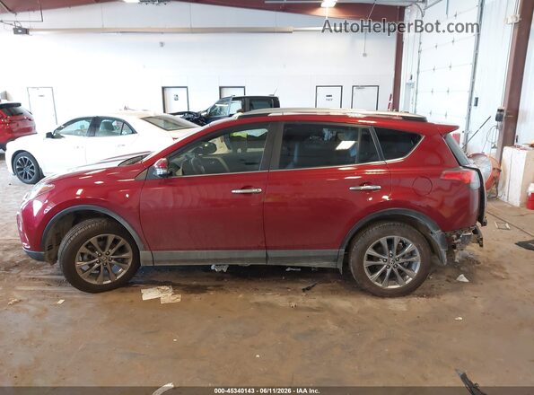 JTMDFREV2JD239522 2018 TOYOTA RAV4 Red Vista interior trasera