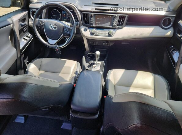JTMDFREV3GJ077359 2016 TOYOTA RAV4 Charcoal Vista del salpicadero