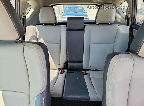 JTMDFREV3GJ077359 2016 TOYOTA RAV4 Charcoal Vista de los asientos traseros