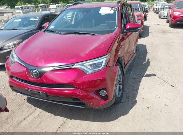 JTMDFREV6JD243525 2018 TOYOTA RAV4 Red Front left