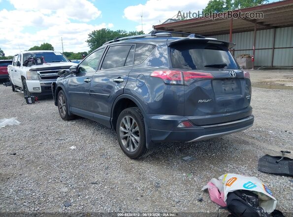 JTMDFREV8JD258155 2018 TOYOTA RAV4 Gray Trasero izquierdo