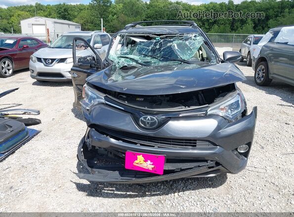 JTMDFREV8JD258155 2018 TOYOTA RAV4 Gray Vista frontal
