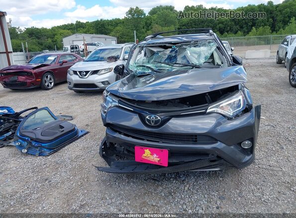 JTMDFREV8JD258155 2018 TOYOTA RAV4 Gray Vista del cuadro de instrumentos