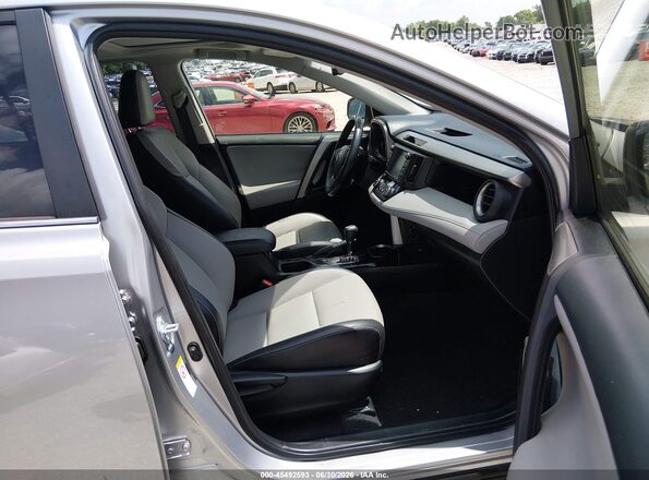JTMDFREV9JJ259297 2018 TOYOTA RAV4 Gray Սալոնի դիմացի տեսք