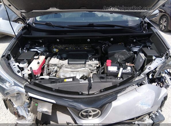JTMDFREV9JJ259297 2018 TOYOTA RAV4 Gray Հետևի տեսք