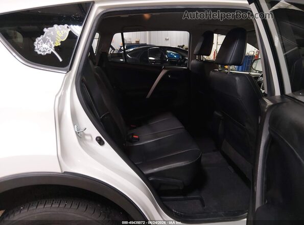 JTMDFREVXGJ059652 2016 TOYOTA RAV4 White VIN კოდის სტიკერის ხედი