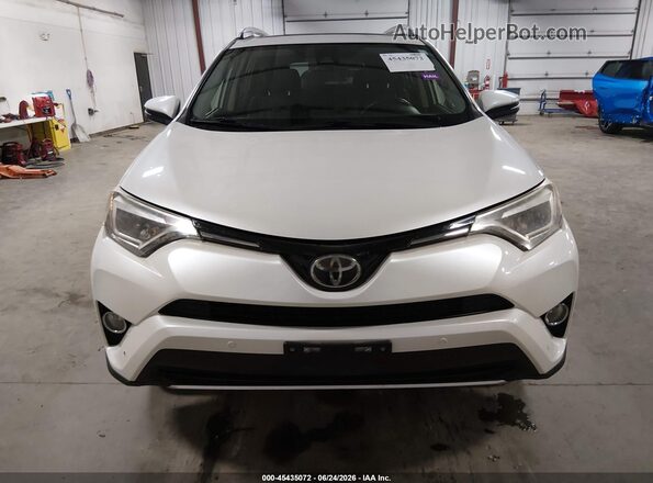 JTMDFREVXGJ059652 2016 TOYOTA RAV4 White ხელსაწყოთა პანელის ხედი