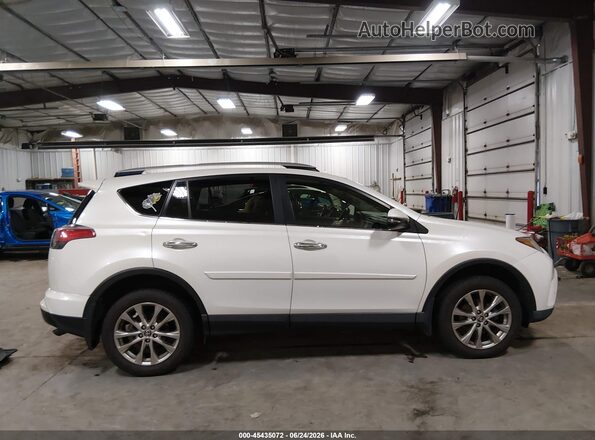 JTMDFREVXGJ059652 2016 TOYOTA RAV4 White უკანა სალონის ხედი