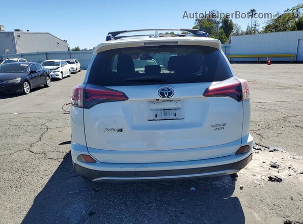 JTMDFREVXHJ136201 2017 TOYOTA RAV4 White Rear view