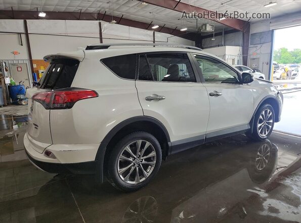 JTMDFREVXJJ731040 2018 TOYOTA RAV4 White Rear right