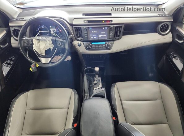 JTMDFREVXJJ731040 2018 TOYOTA RAV4 White Dashboard view
