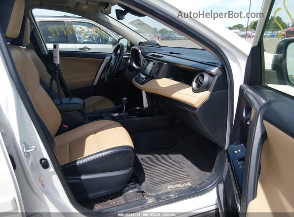 JTMDJREV0GD041206 2016 TOYOTA RAV4 HYBRID White Front interior view