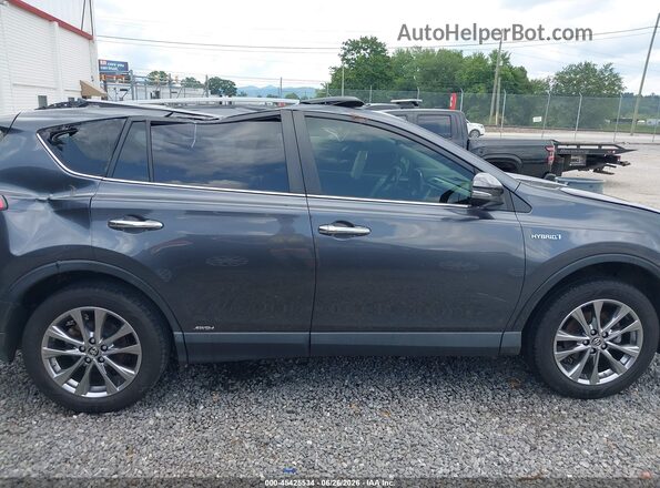 JTMDJREV0HD080959 2017 TOYOTA RAV4 HYBRID Gray Rear interior view