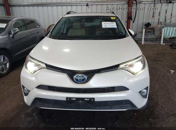 JTMDJREV0HD144319 2017 TOYOTA RAV4 HYBRID White ხელსაწყოთა პანელის ხედი
