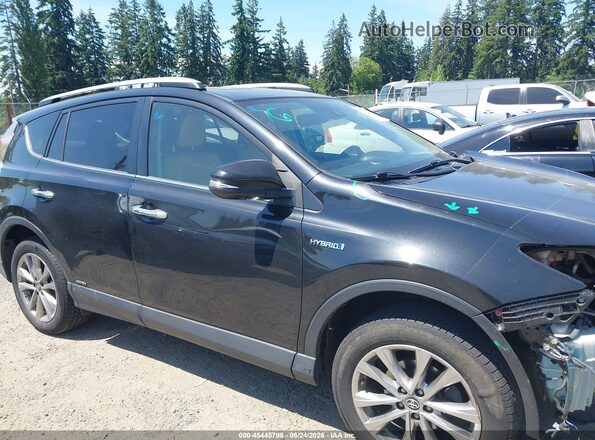 JTMDJREV1HD078086 2017 TOYOTA RAV4 HYBRID Black Вид задньої частини салону