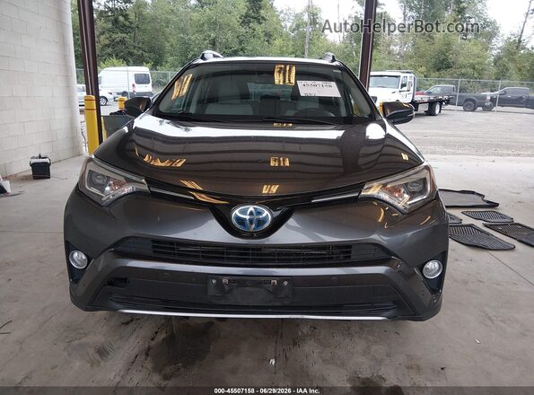 JTMDJREV2JD191681 2018 TOYOTA RAV4 HYBRID Gray Rear interior view