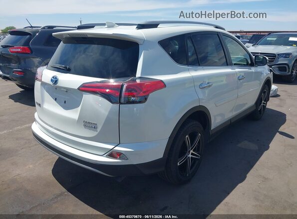 JTMDJREV2JD227384 2018 TOYOTA RAV4 HYBRID White 