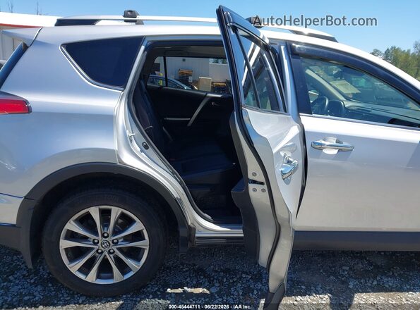 JTMDJREV3GD026683 2016 TOYOTA RAV4 HYBRID Silver VIN კოდის სტიკერის ხედი