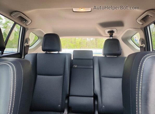 JTMDJREV4GD004479 2016 TOYOTA RAV4 White Rear seats view