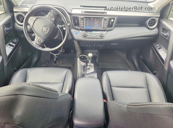 JTMDJREV4GD004479 2016 TOYOTA RAV4 White Dashboard view