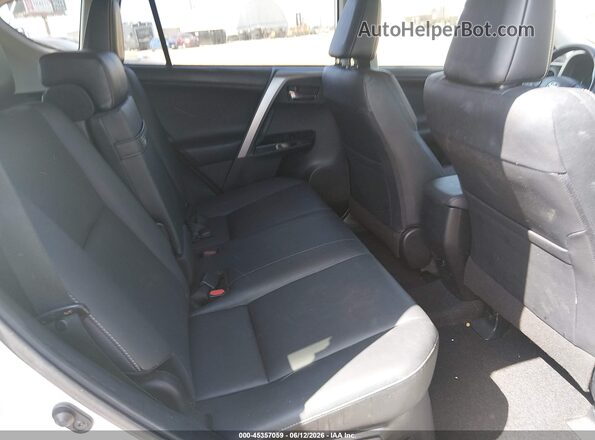 JTMDJREV5GD054548 2016 TOYOTA RAV4 HYBRID White Widok naklejki z numerem VIN