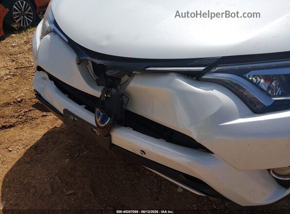 JTMDJREV5GD054548 2016 TOYOTA RAV4 HYBRID White Widok z przodu