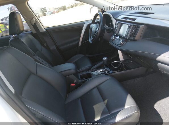 JTMDJREV5GD054548 2016 TOYOTA RAV4 HYBRID White Widok wnętrza z przodu