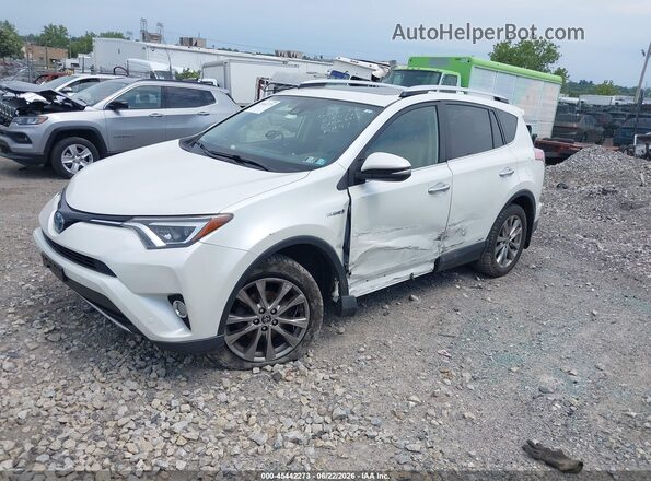 JTMDJREV6GD003527 2016 TOYOTA RAV4 HYBRID White Vista tres cuartos delantera izquierda