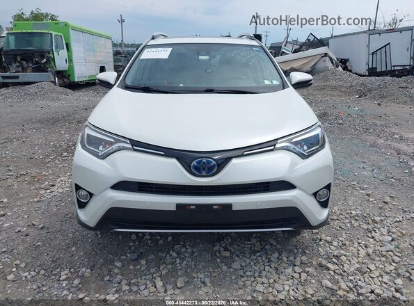 JTMDJREV6GD003527 2016 TOYOTA RAV4 HYBRID White Vista interior trasera