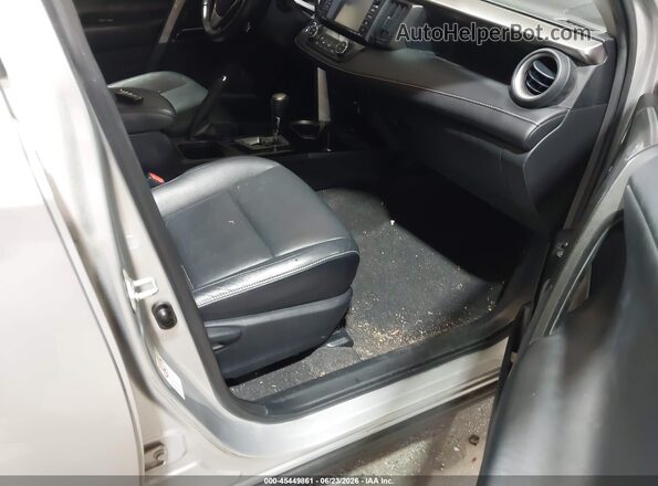 JTMDJREVXGD048972 2016 TOYOTA RAV4 HYBRID Silver Вид салону спереду