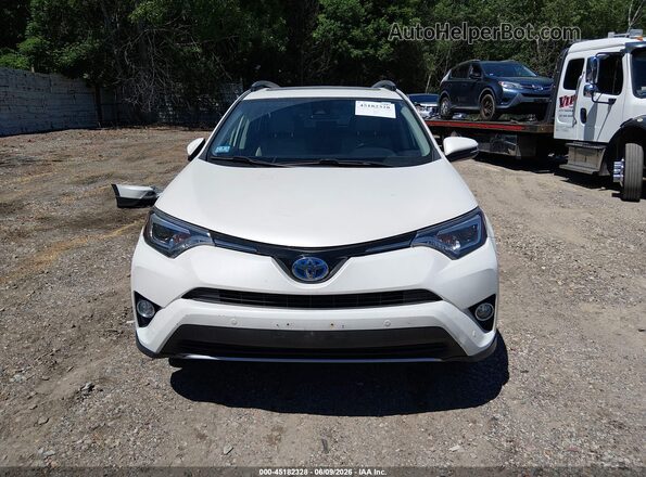 JTMDJREVXJD170948 2018 TOYOTA RAV4 HYBRID Белый Вид задней части салона