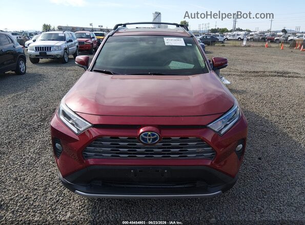JTMDWRFV5KD020277 2019 TOYOTA RAV4 HYBRID Red Vista interior trasera