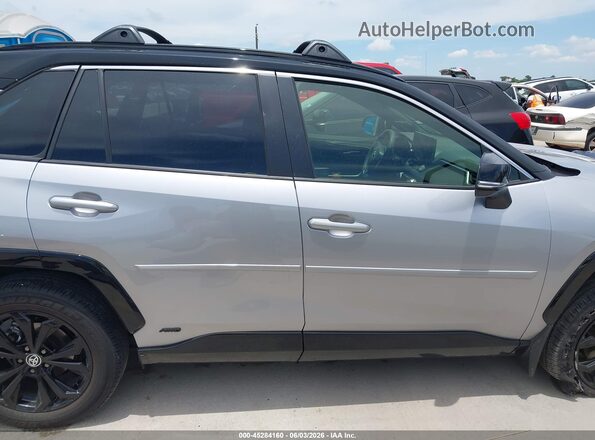 JTME6RFV1SD578289 2025 TOYOTA RAV4 HYBRID Silver Вид задньої частини салону