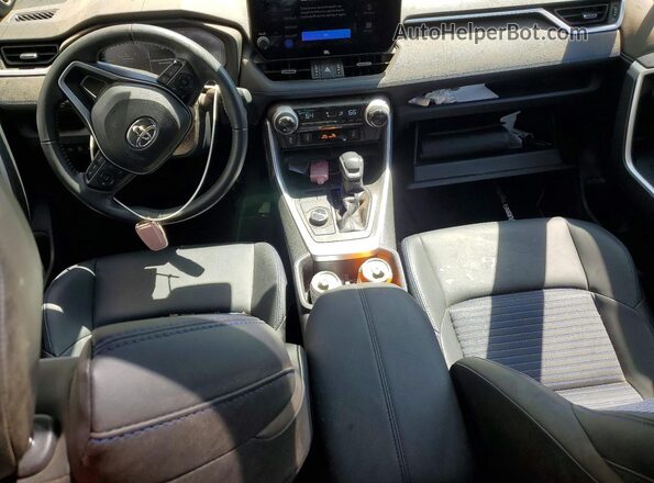 JTME6RFV3RJ055058 2024 TOYOTA RAV4 White Dashboard view