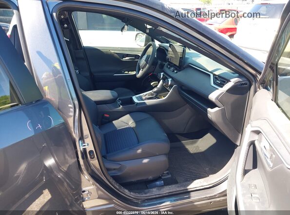 JTME6RFV3SD570338 2025 TOYOTA RAV4 HYBRID Gray Front interior view