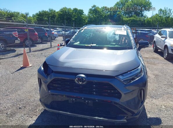 JTME6RFV3SD570338 2025 TOYOTA RAV4 HYBRID Gray Rear interior view