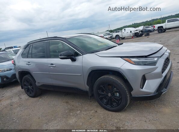 JTME6RFV3SD579217 2025 TOYOTA RAV4 HYBRID Silver Вид задньої частини салону