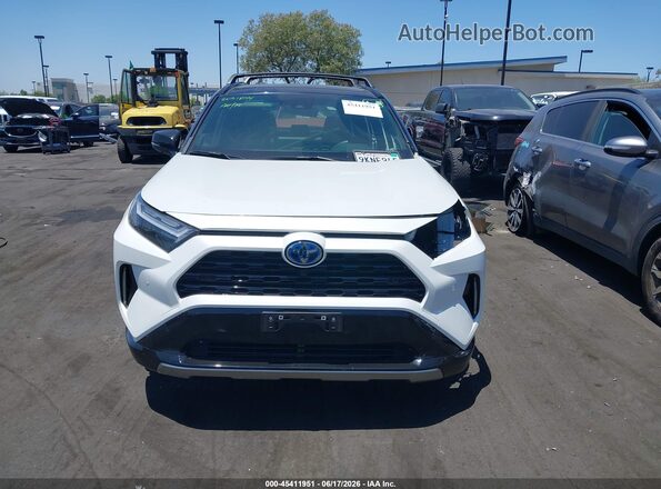 JTME6RFV7RJ042300 2024 TOYOTA RAV4 HYBRID White Rear interior view