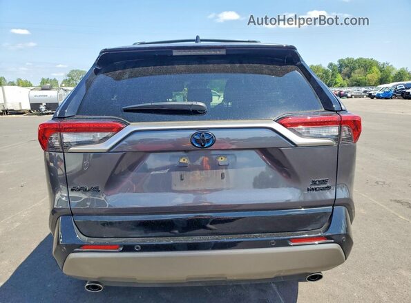 JTME6RFV7RJ057654 2024 TOYOTA RAV4 Charcoal Vista trasera