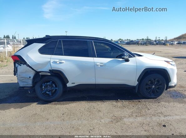 JTME6RFV8PD539626 2023 TOYOTA RAV4 HYBRID White Widok wnętrza z tyłu