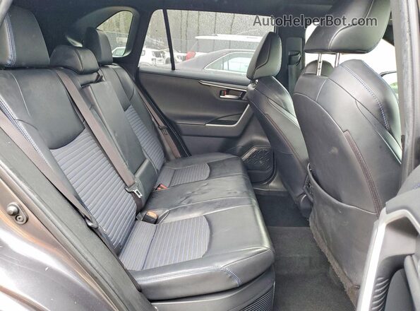 JTMEWRFV1KJ005247 2019 TOYOTA RAV4 Gray Vista interior trasera