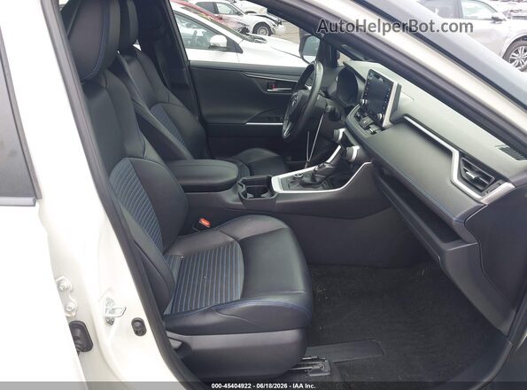 JTMEWRFVXKJ014089 2019 TOYOTA RAV4 HYBRID Белый Вид салона спереди