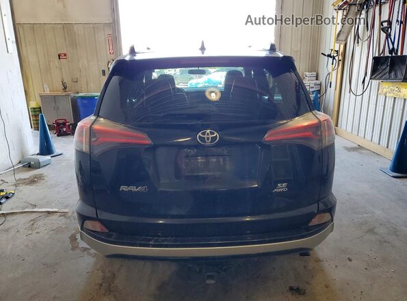 JTMJFREV2GJ065254 2016 TOYOTA RAV4 Black Rear view