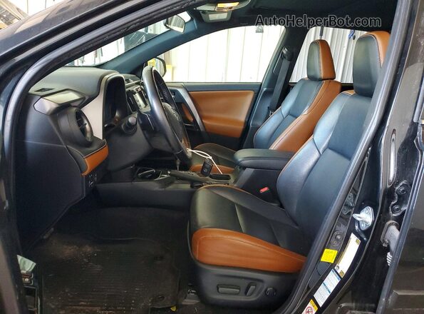 JTMJFREV2GJ065254 2016 TOYOTA RAV4 Black Front interior view